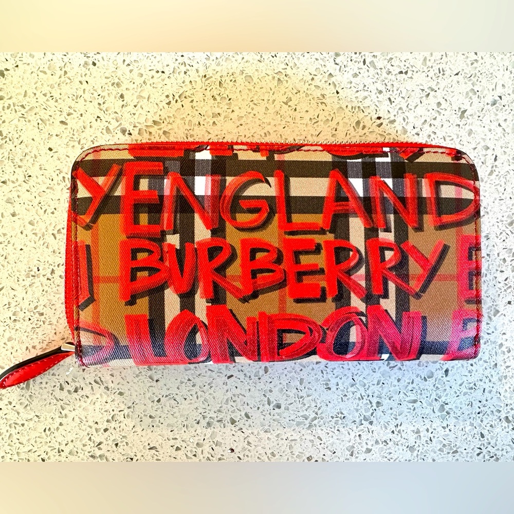 Burberry red and tan graffiti wallet with Burberry dust bag.